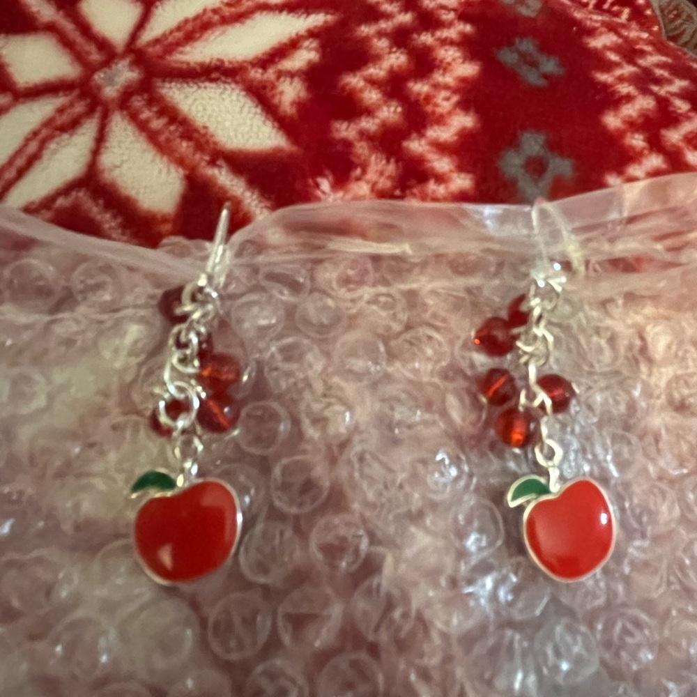 Apple earrings with red baubles and pierced hooks